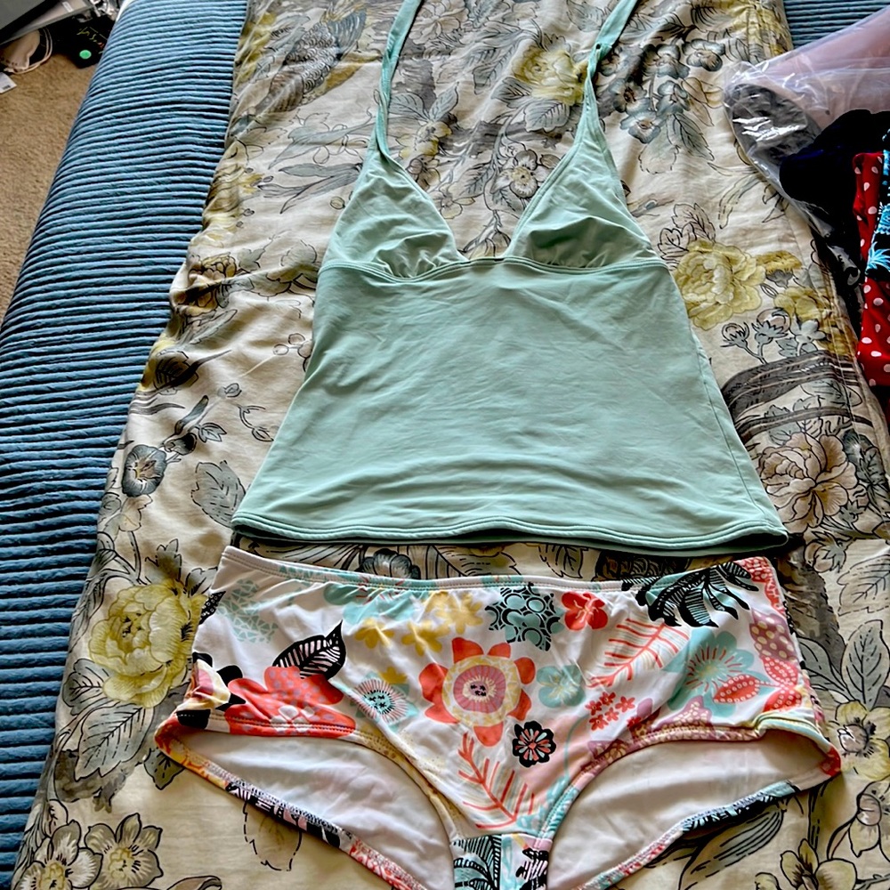 Calvin Klein Tankini -Top Medium and Bottom Large. Very cute.